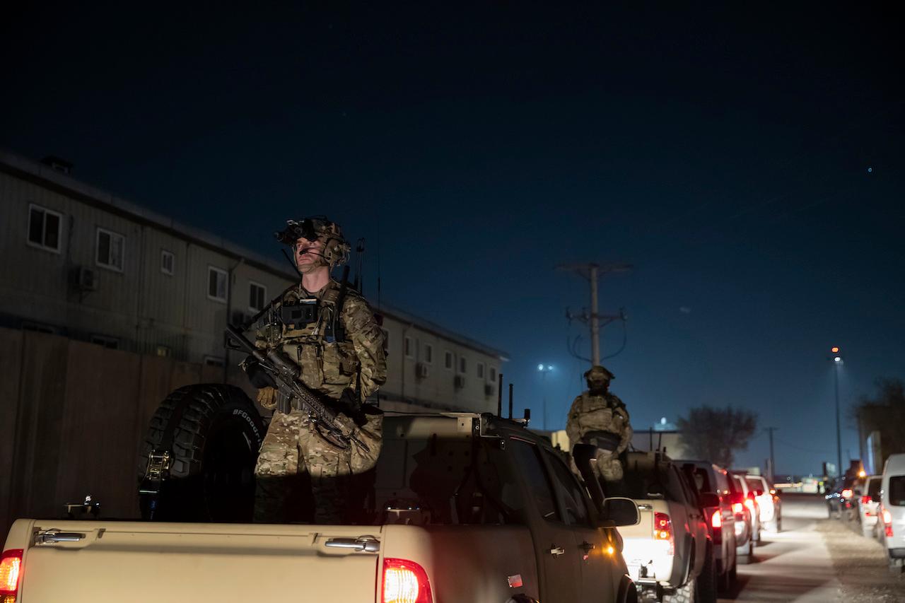 Armed soldiers stand guard at Bagram Air Field, Afghanistan, Nov 28, 2019. The US has some 2,500 troops in the country as part of a 9,600-strong Nato mission. Photo: AP