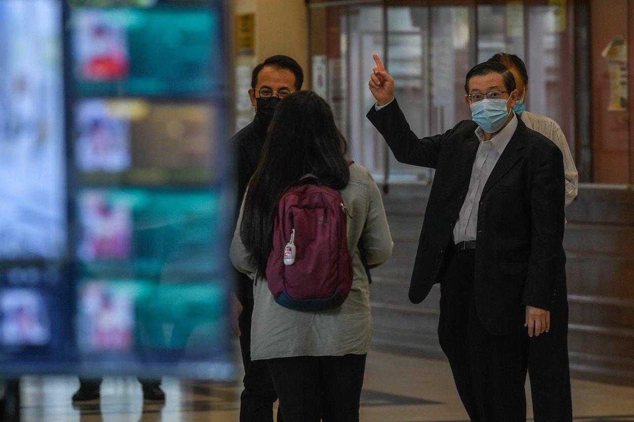 Former finance minister Lim Guan Eng (right) at the Kuala Lumpur court complex today. Photo: Bernama