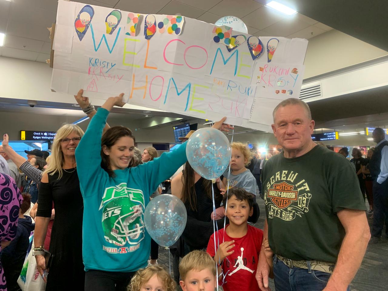 A family waits for the arrival of a relative at the Wellington International Airport in Wellington, New Zealand, April 19. Photo: AP
