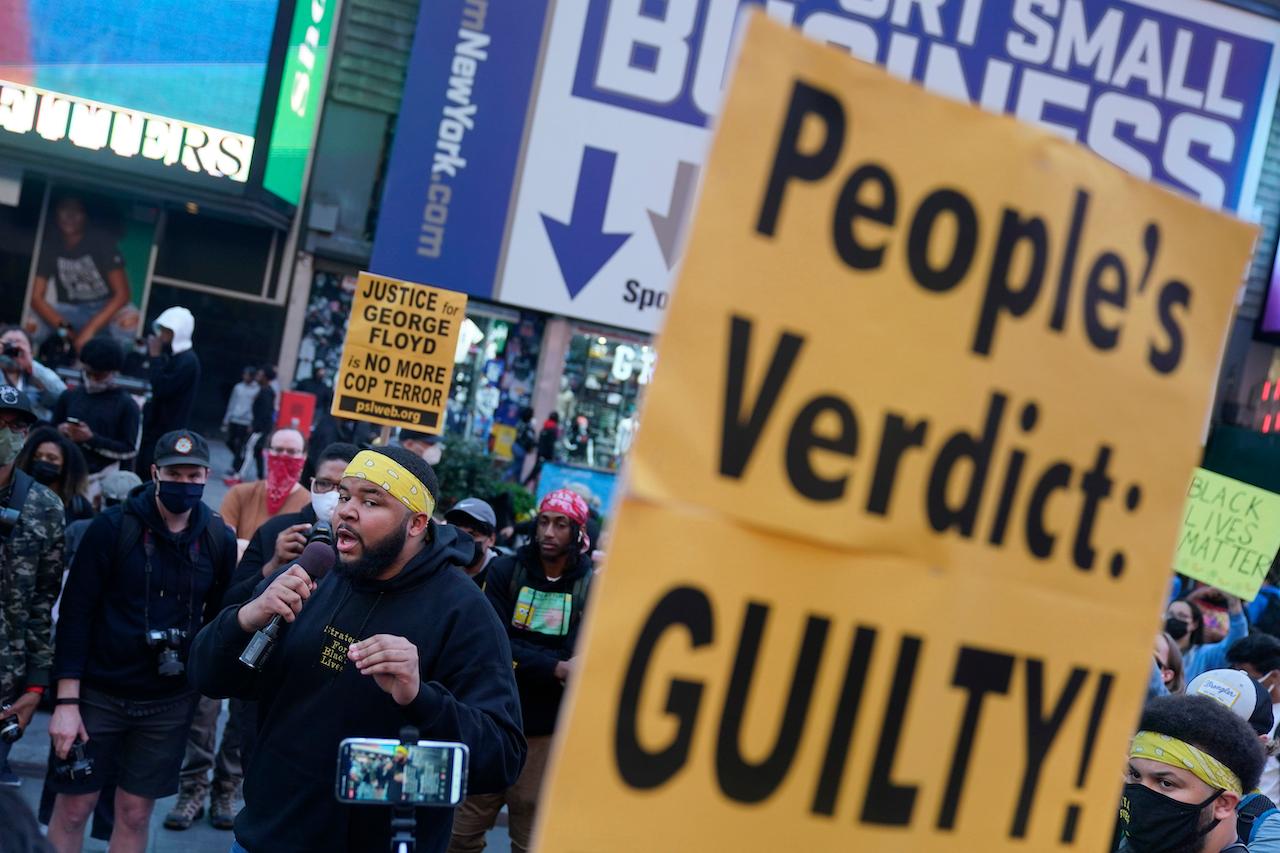 A small group of protesters gather after the verdict in the trial of Derek Chauvin was announced in Times Square, New York, April 20. Former Minneapolis police officer Chauvin has been convicted of murder and manslaughter in the death of George Floyd. Photo: AP