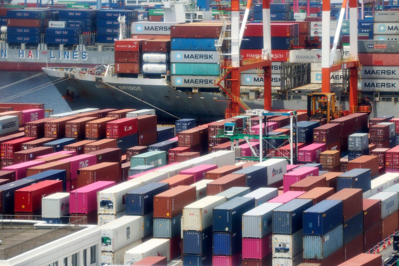 Containers are piled up at a port in Yokohama, south of Tokyo, June 17, 2020. The Covid-19 pandemic and its fallout has had a heavy impact on global supply chains and interconnected markets. Photo: AP