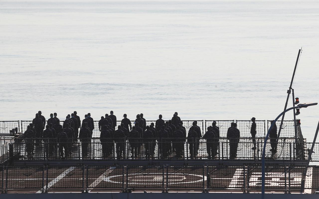Members of the Indonesian navy hold a morning briefing on their ship before the search for submarine KRI Nanggala that went missing while participating in a training exercise on Wednesday, off Banyuwangi, East Java, Indonesia, April 25. Photo: AP