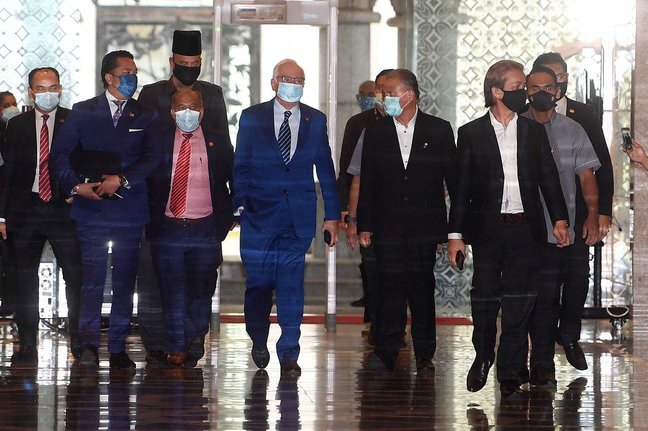 Former prime minister Najib Razak (centre) arrives at the Court of Appeal in Putrajaya today. Photo: Bernama