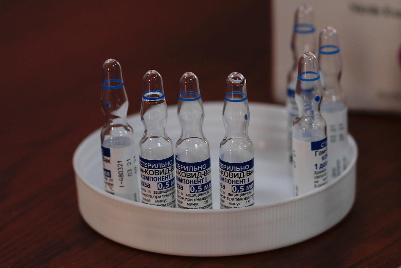 Vials of the Sputnik V vaccine for Covid-19 sit in a tray during the start of vaccinations for people over age 60 at the Universidad Mayor de San Andres public university in La Paz, Bolivia, April 27. Photo: AP