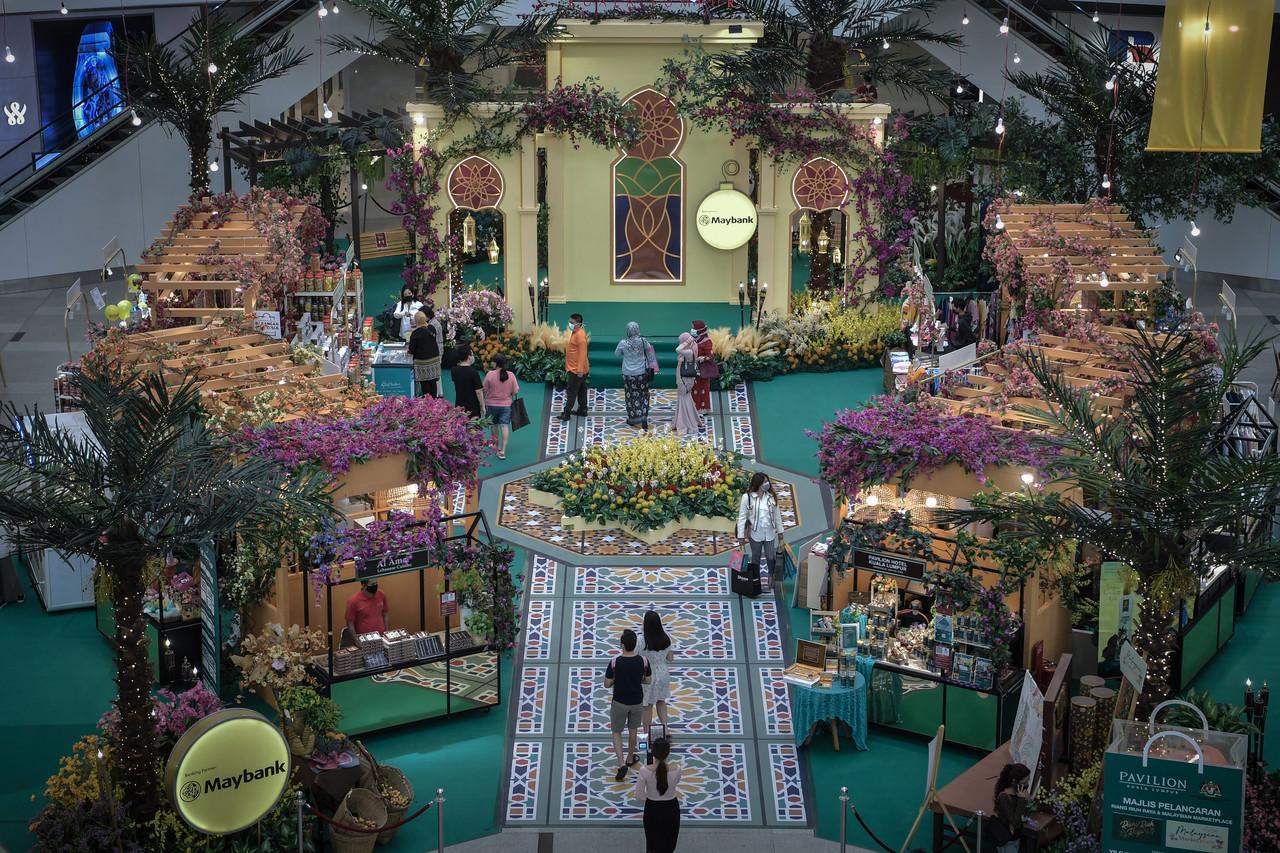 Shoppers enjoy the Hari Raya decorations at a mall in Kuala Lumpur ahead of Aidilfitri which is expected to fall on May 13 this year. Photo: Bernama