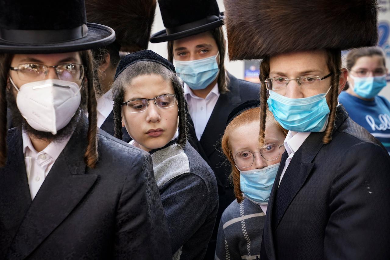 Members of the Orthodox Jewish community in the Borough Park neighbourhood of the Brooklyn borough of New York, Oct 7, 2020. Anti-vaccine sentiment is persistent in pockets of the Orthodox Jewish community. Photo: AP
