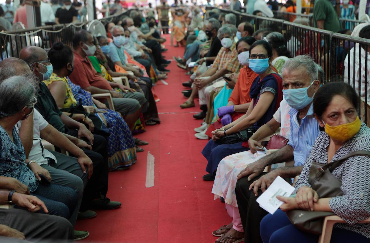 People wait to receive Covid-19 vaccines in Mumbai, India, in this April 29 file photo. Photo: AP