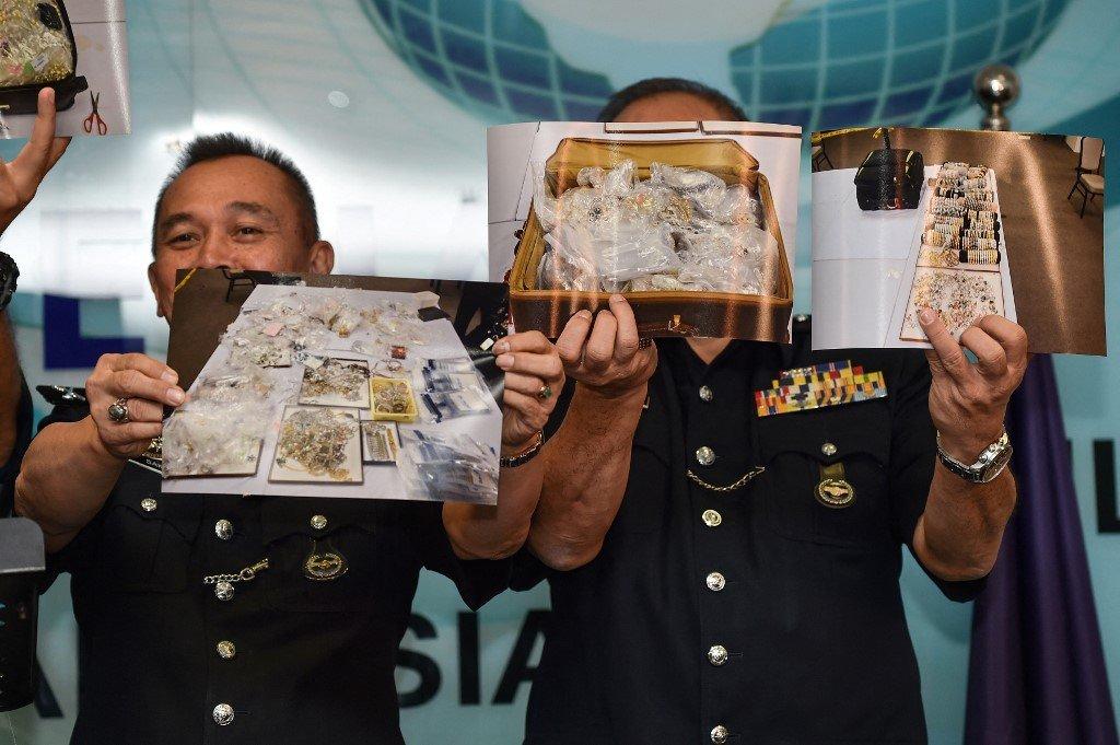 Rampasan barangan oleh polis bernilai RM114 juta yang didakwa milik Umno dan bekas perdana menteri Najib Razak. Gambar: Bernama