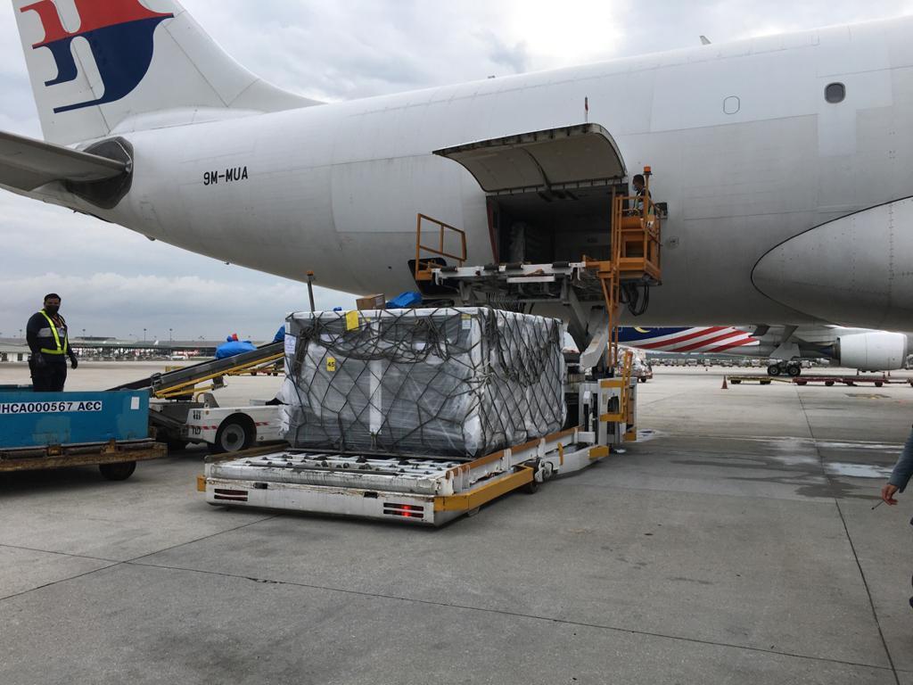 The second shipment of AstraZeneca Covid-19 vaccine is unloaded upon arrival in Kuala Lumpur today.