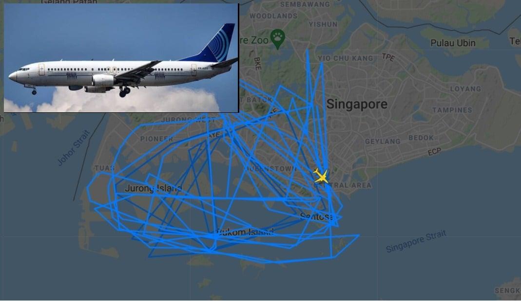The blue line shows the flight of the Boeing 737-400 (inset) owned by the Israel Aerospace Industries-Elta, as tracked on Flightradar24.