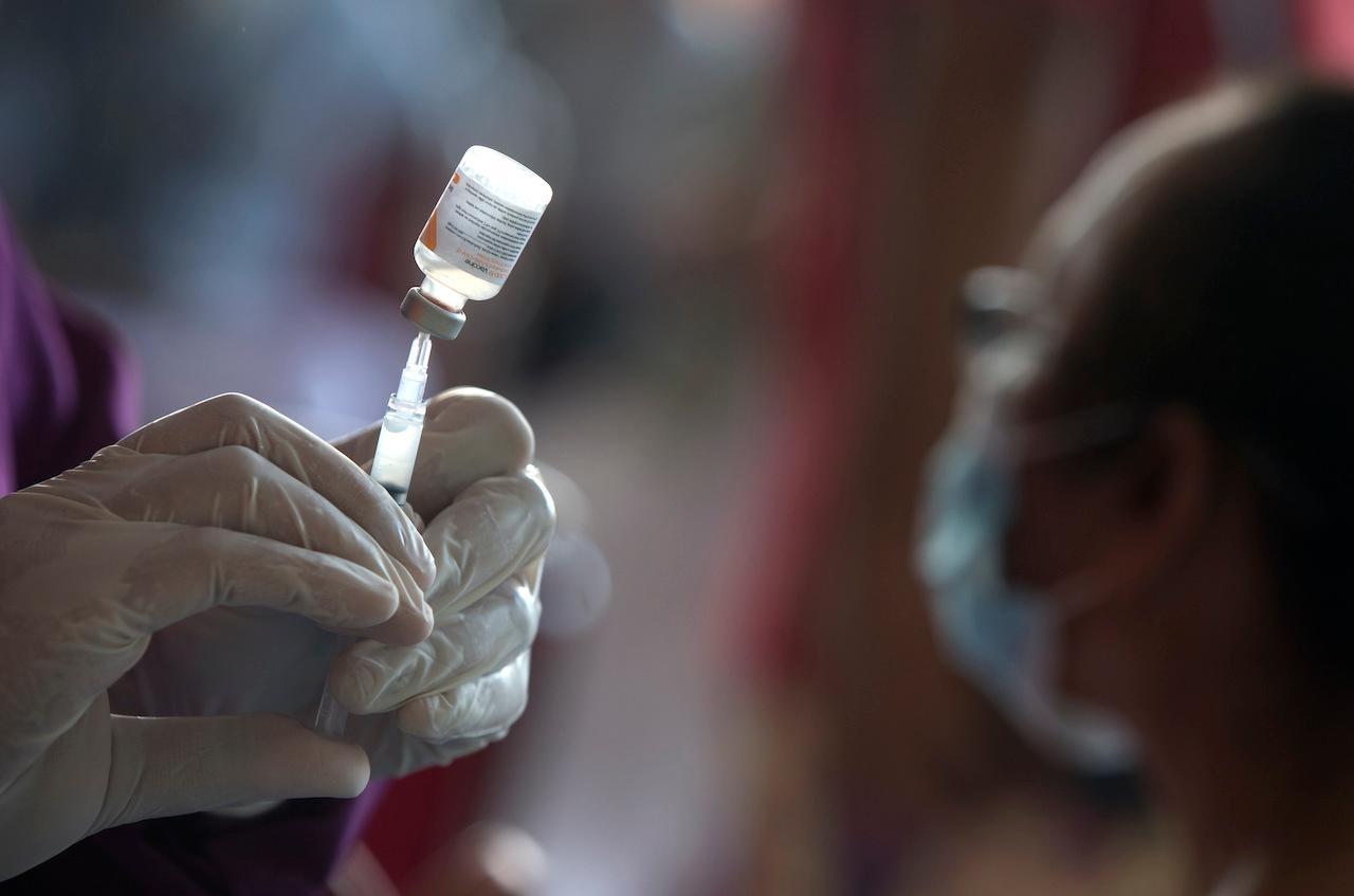 Indonesia has been hit hard by the coronavirus pandemic, and it is rolling out a massive vaccination programme for many of its nearly 270 million people. Photo: AP
