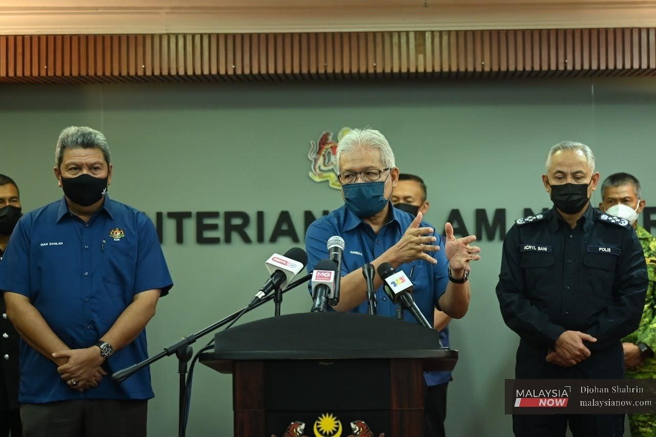 Home Minister Hamzah Zainudin speaks at a press conference on the impending lockdown in Kuala Lumpur today.