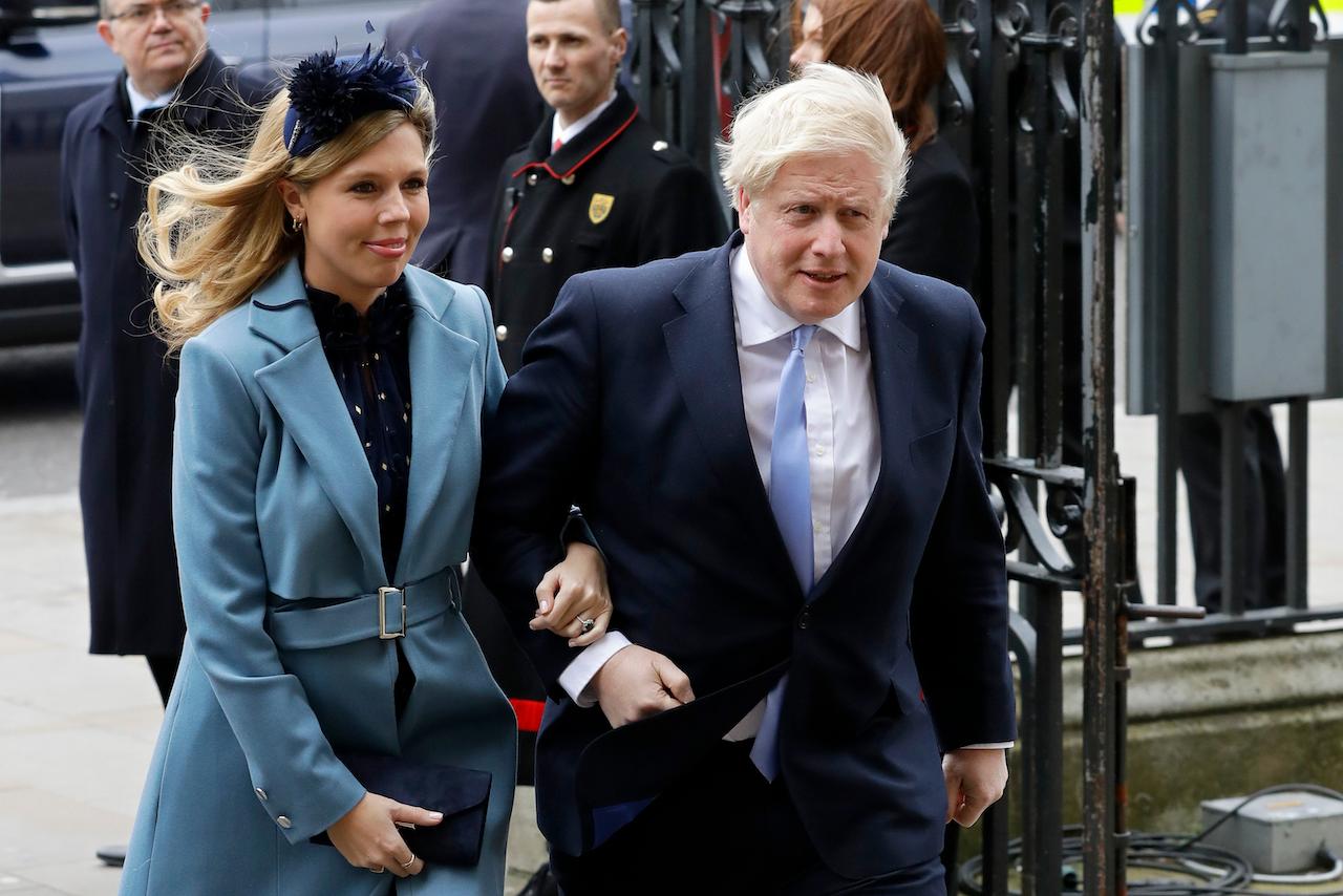 British Prime Minister Boris Johnson and his partner Carrie Symonds arrive to attend the annual Commonwealth Day service at Westminster Abbey in London in this March 9, 2020, file photo. Photo: AP