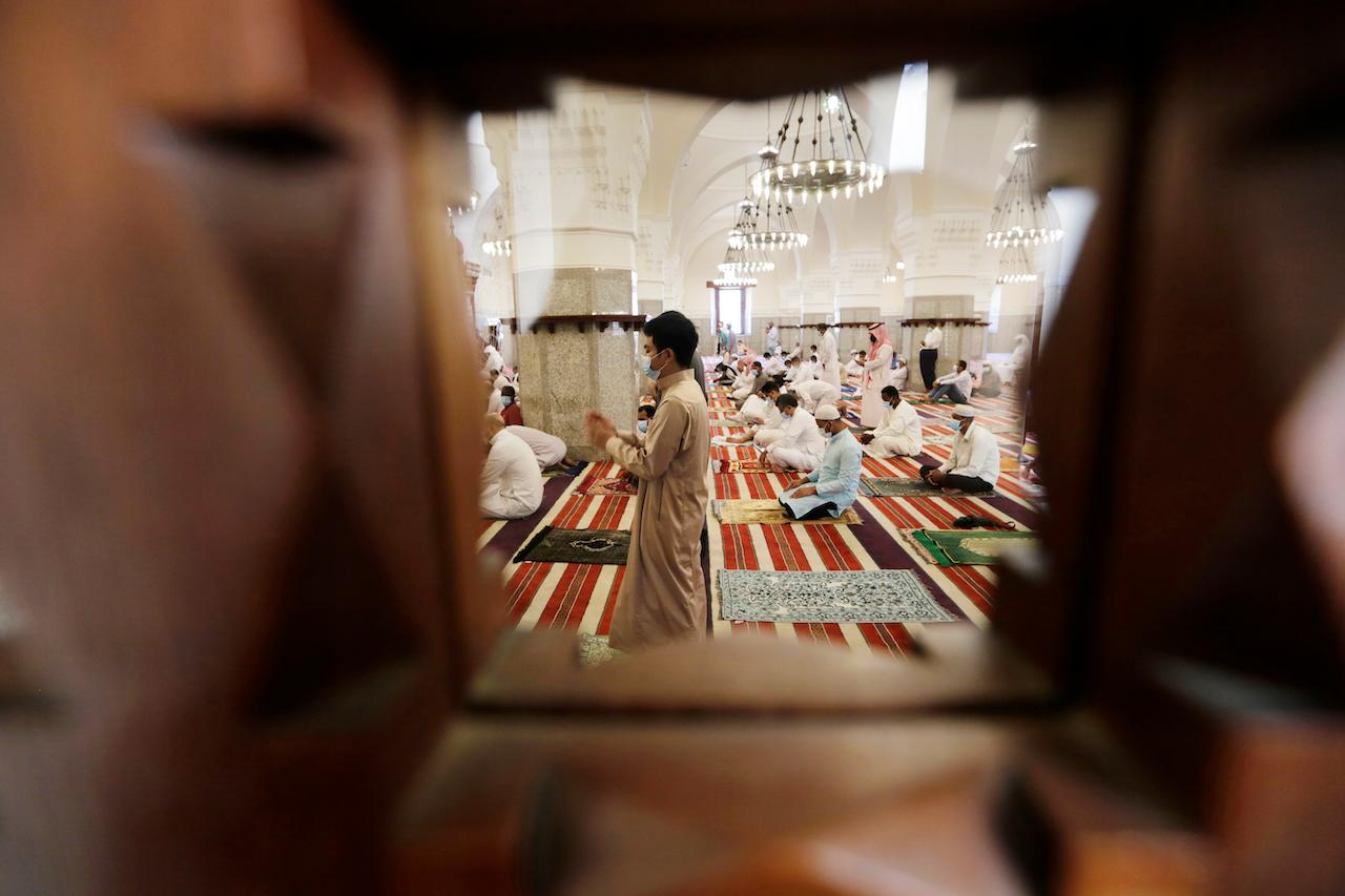 Muslims perform the Friday prayer as they practise social distancing to curb the spread of the new coronavirus, at Al- Jaffali mosque in Jiddah, Saudi Arabia, April 30. Photo: AP