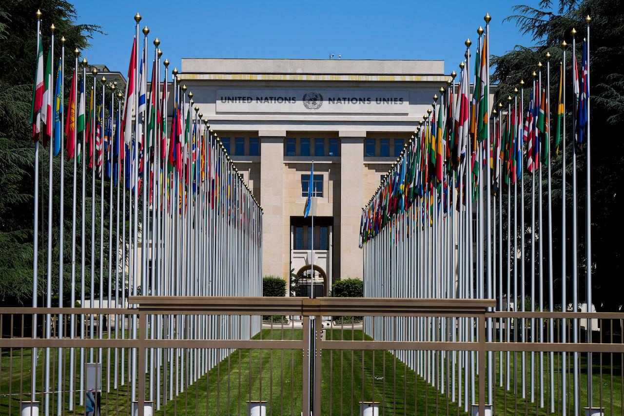 Flagpoles stand in rows in front of a building of the United Nations in Geneva, Switzerland, June 14. Photo: AP