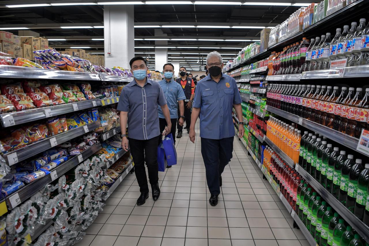 Home Minister Hamzah Zainudin checks SOP compliance at a mall in Kuala Lumpur today. Photo: Bernama