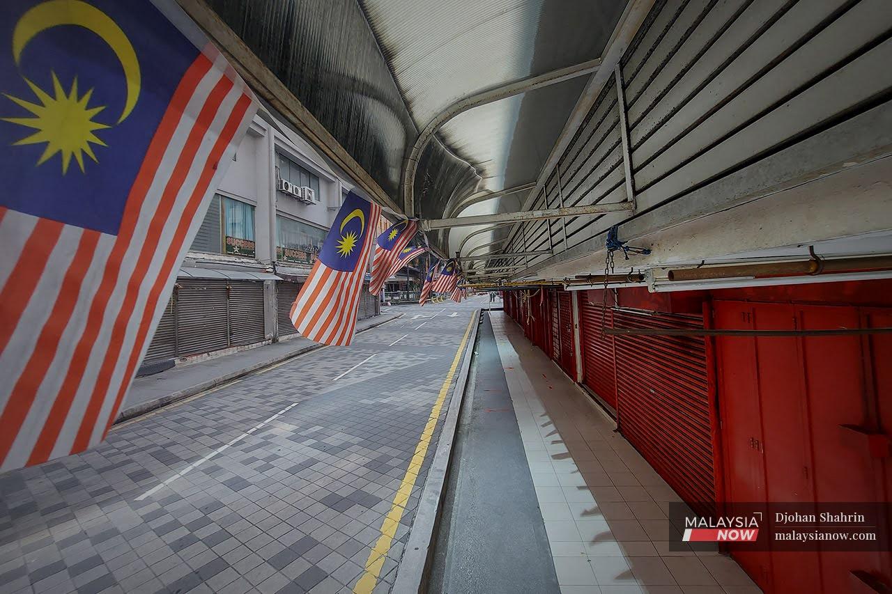 Rows of shops stand closed at Jalan Tuanku Abdul Rahman in Kuala Lumpur on June 2, the second day of a two-week lockdown imposed throughout the country to curb the spread of Covid-19.