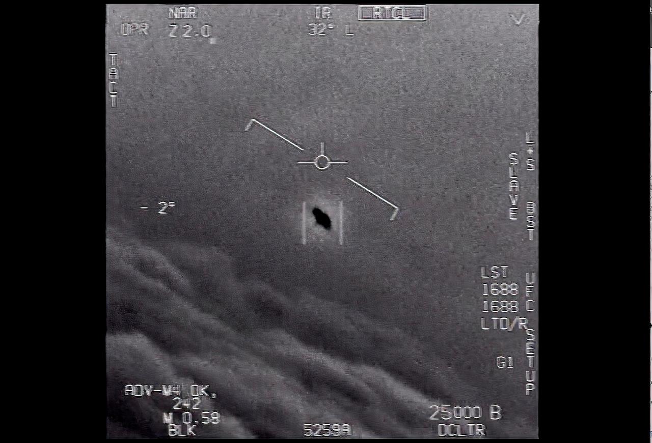 In this image from video provided by the Department of Defense labelled Gimbal, from 2015, an unexplained object (centre) is tracked as it soars high along the clouds, travelling against the wind. Photo: AP