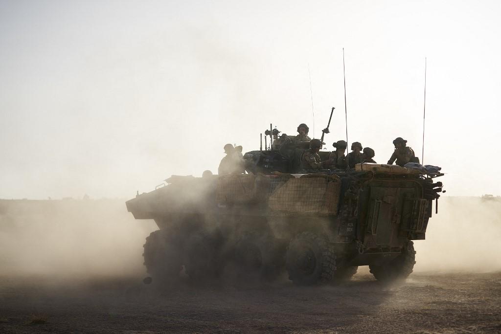 In this file photograph taken on Nov 11, 2019, an armoured personnel carrier of the French army patrols a rural area during the Bourgou IV operation in northern Burkina Faso along the border with Mali and Niger. Around 160 civilians were killed in the deadliest attack in Burkina Faso since jihadist violence erupted in the country in 2015. Photo: AFP