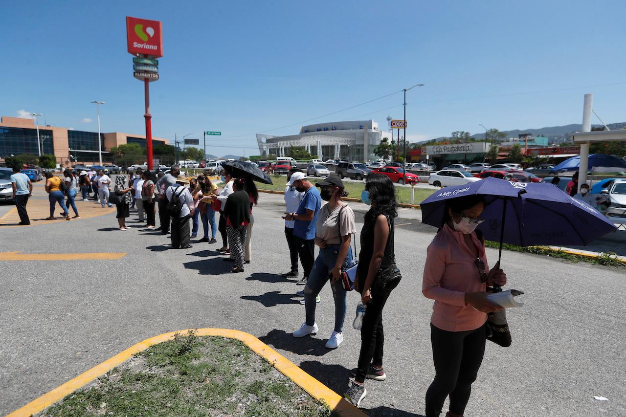 Voters line up during mid-term elections in Chilpancingo, Mexico, June 6. Mexicans are electing the entire lower house of Congress, almost half the country's governors and most mayors. Photo: AP