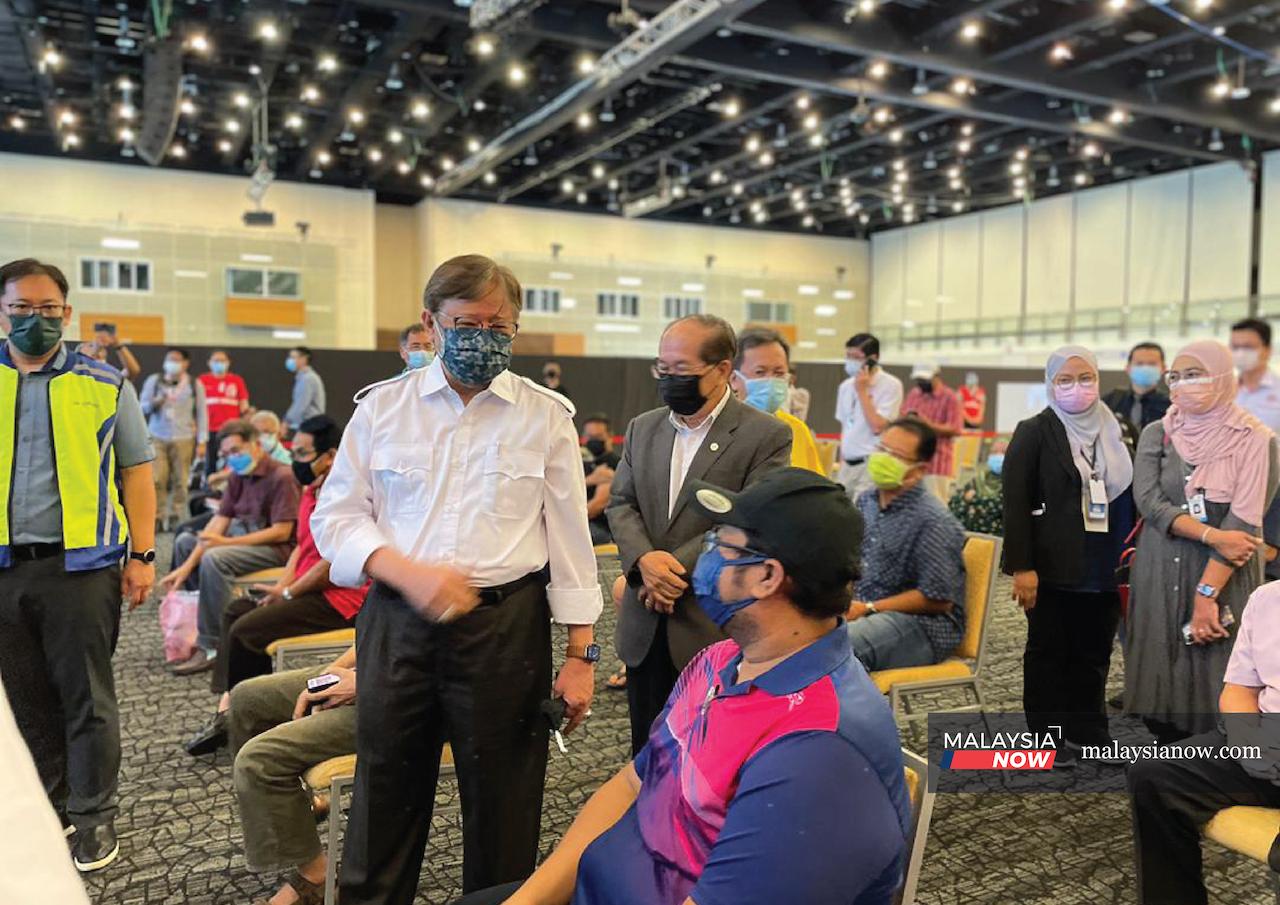 Sarawak Chief Minister Abang Johari Openg visits a vaccination centre in Kuching today.