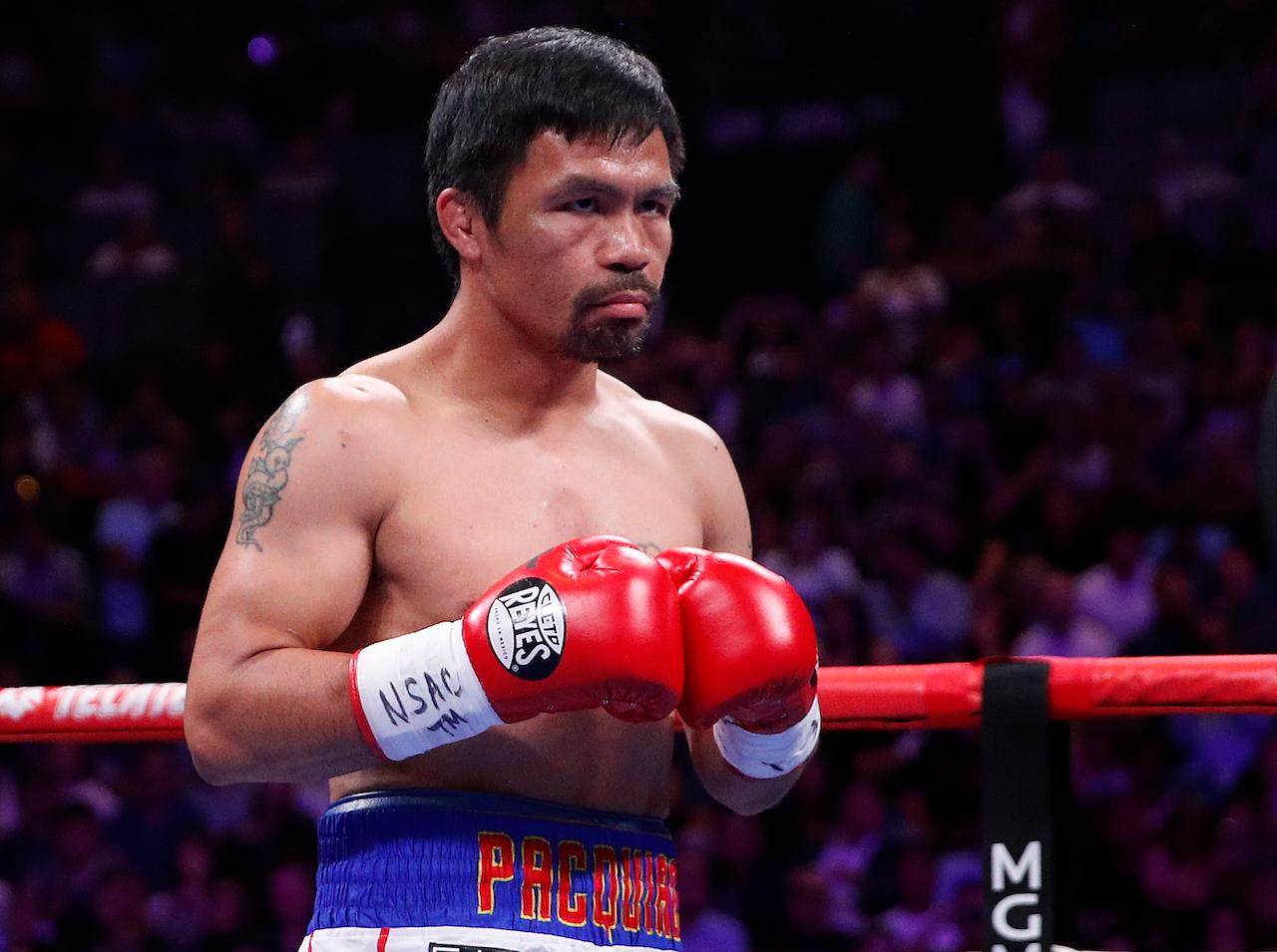 Former Filipino boxing star Manny Pacquiao is the only boxer in history to win 12 major world titles in eight different weight divisions. Photo: AP