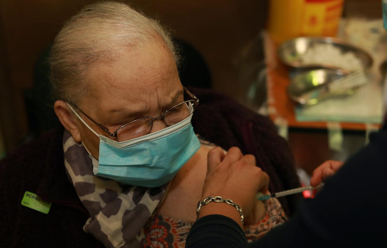 A senior citizen receives a first dose of the Pfizer Covid-19 vaccine at a vaccination centre at the Karl Bremer Hospital, in Cape Town, South Africa, June 11. Photo: AP