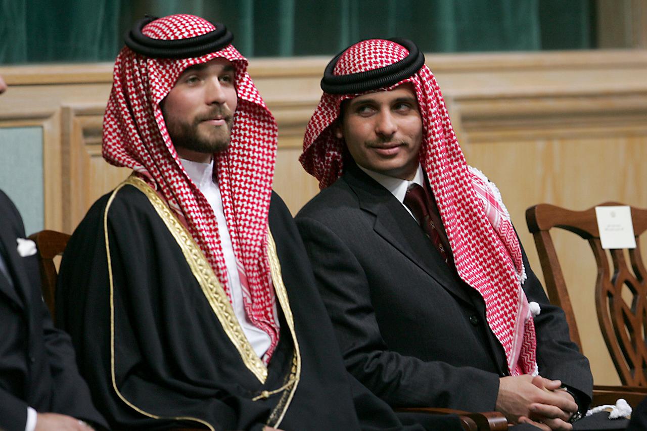 In this Nov 28, 2006 file photo, Prince Hamzah (right) and Prince Hashem (left), half brothers of King Abdullah II of Jordan, attend the opening of the parliament in Amman, Jordan. Photo: AP