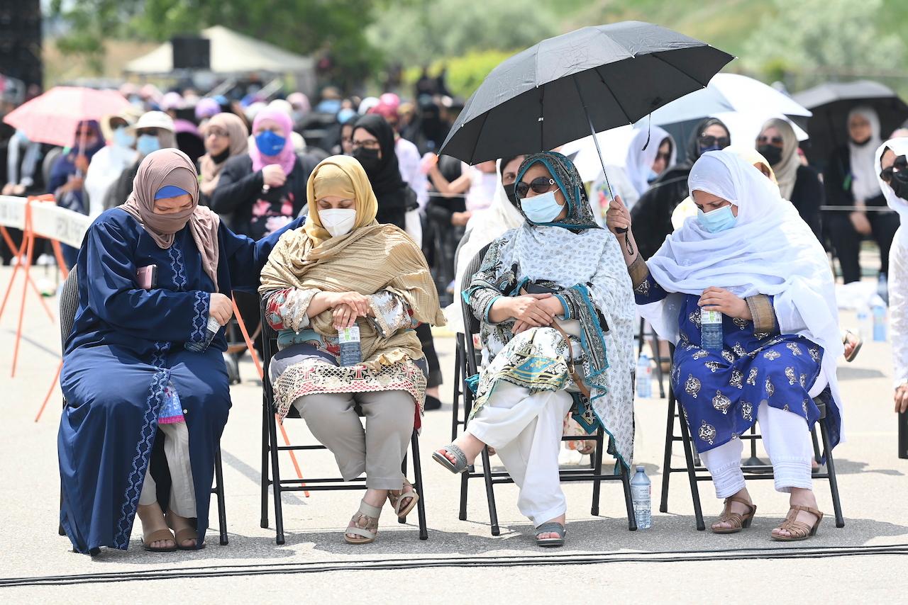 Family members attend the funeral service for the four Muslim family members killed in a deadly vehicle attack, at the Islamic Centre of Southwest Ontario in London, Ontario, Canada, June 12. Photo: AP