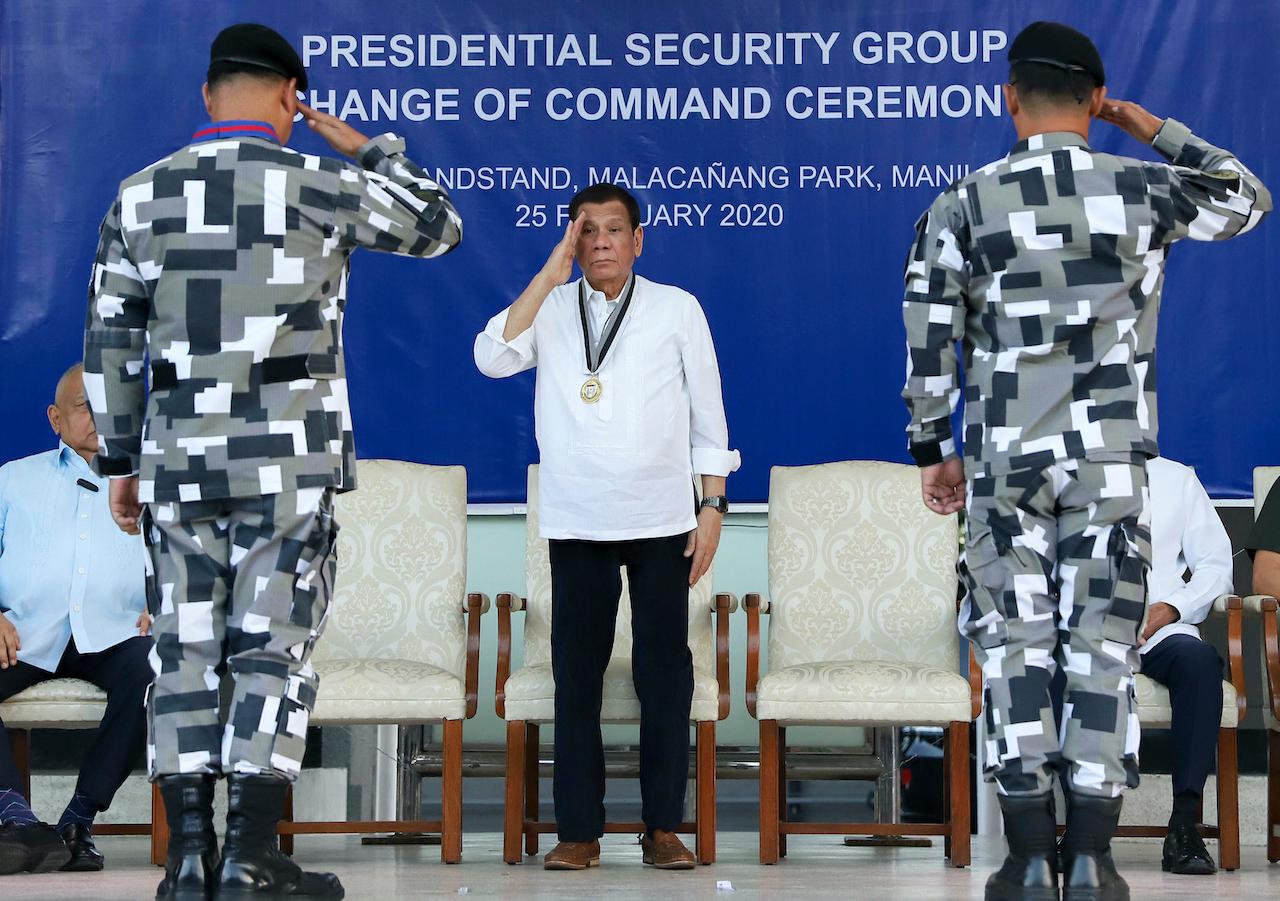 Philippine President Rodrigo Duterte (centre) salutes during the Presidential Security Group Change of Command ceremony at the PSG Compound in Malacañang Park, Manila, Philippines in this Feb 25, 2020 file photo. Photo: AP