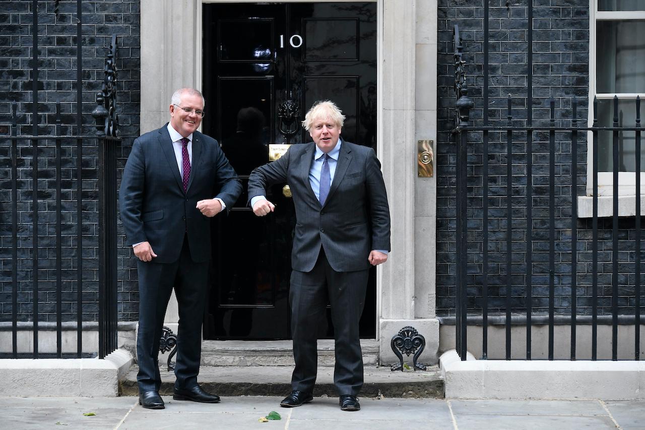 Britain's Prime Minister Boris Johnson (left) greets Australia's Prime Minister Scott Morrison at 10 Downing Street, in London, June 14. Photo: AP
