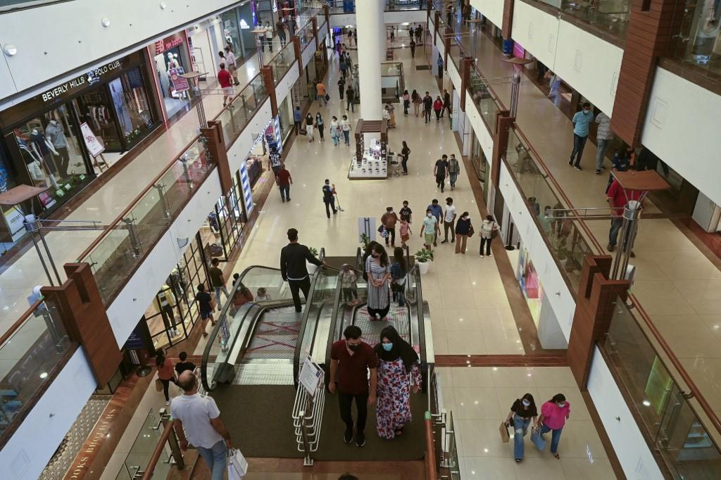 People visit the Select City Mall after authorities eased a lockdown imposed as a preventive measure against the Covid-19 coronavirus, in New Delhi on June 19. Photo: AFP