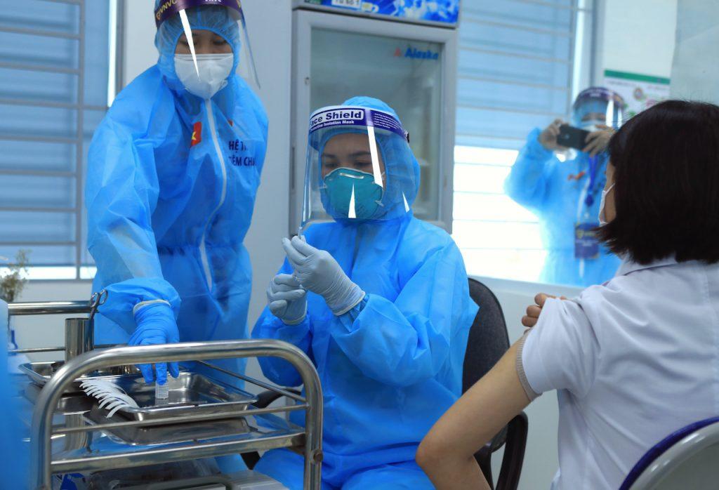 A health worker prepares a dose of AstraZeneca Covid-19 vaccine at the Hospital for Tropical Diseases in Hanoi, Vietnam, March 8. Vietnam's domestic inoculation programme, which started in March, has so far relied heavily on around four million shots of AstraZeneca's vaccine. Photo: AP