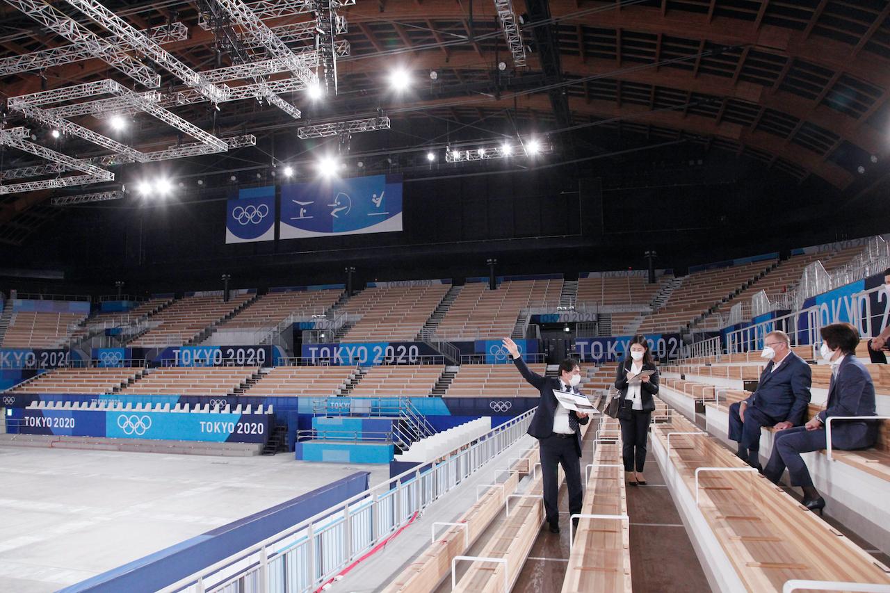 International Olympic Committee vice-president John Coates (second from right) and Tokyo 2020 Olympics Organising Committee president Seiko Hashimoto (right) visit the Ariake Gymnastics Centre for an inspection of Olympics venues in Tokyo, June 23. Photo: AP