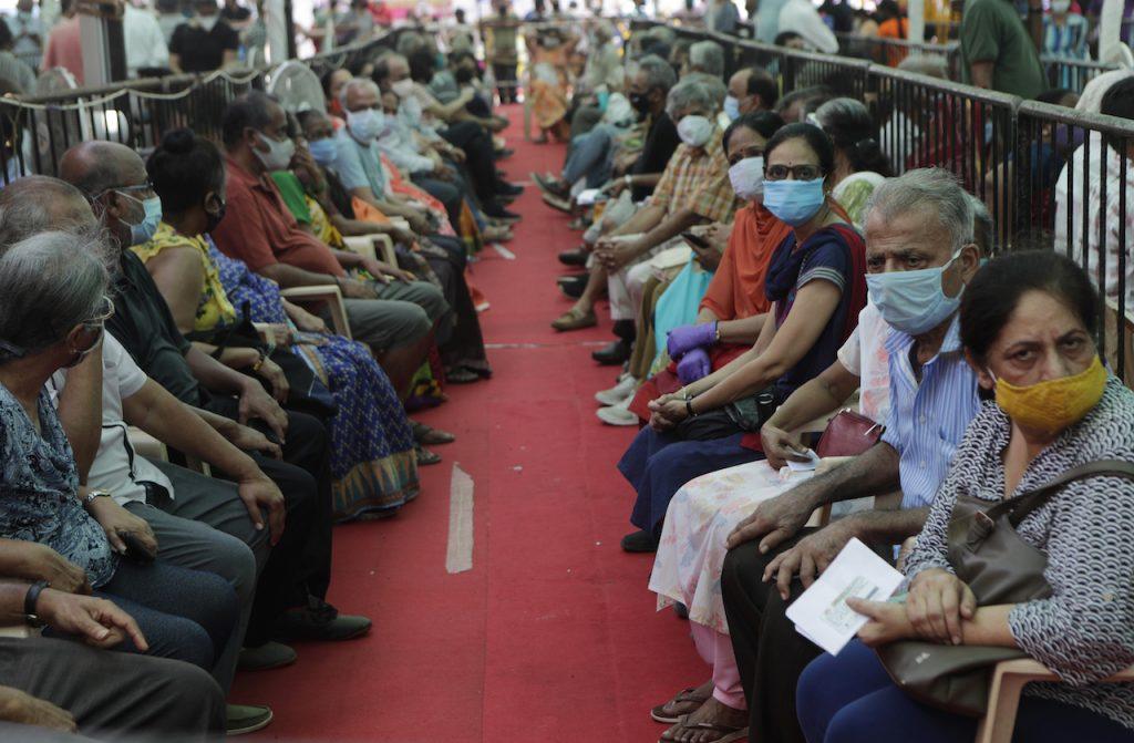 People wait to receive Covid-19 vaccines in Mumbai, India, in this April 29 file photo. Photo: AP