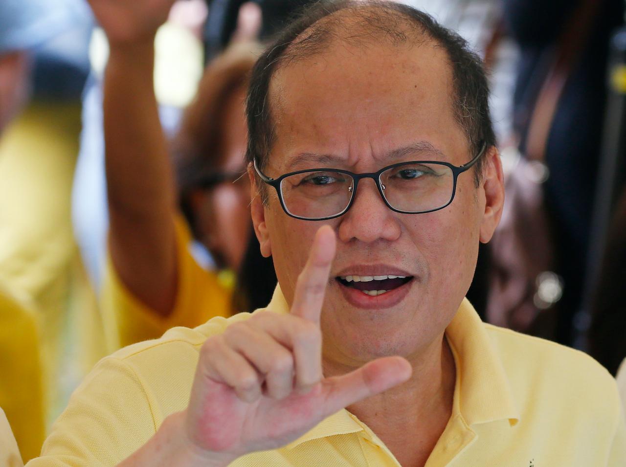 Former Philippines president Benigno Aquino flashes the 'L' sign meaning 'Fight!' At an event commemorating the assassination of his father, Benigno Aquino Jr, on Aug 21, 2018. Photo: AP