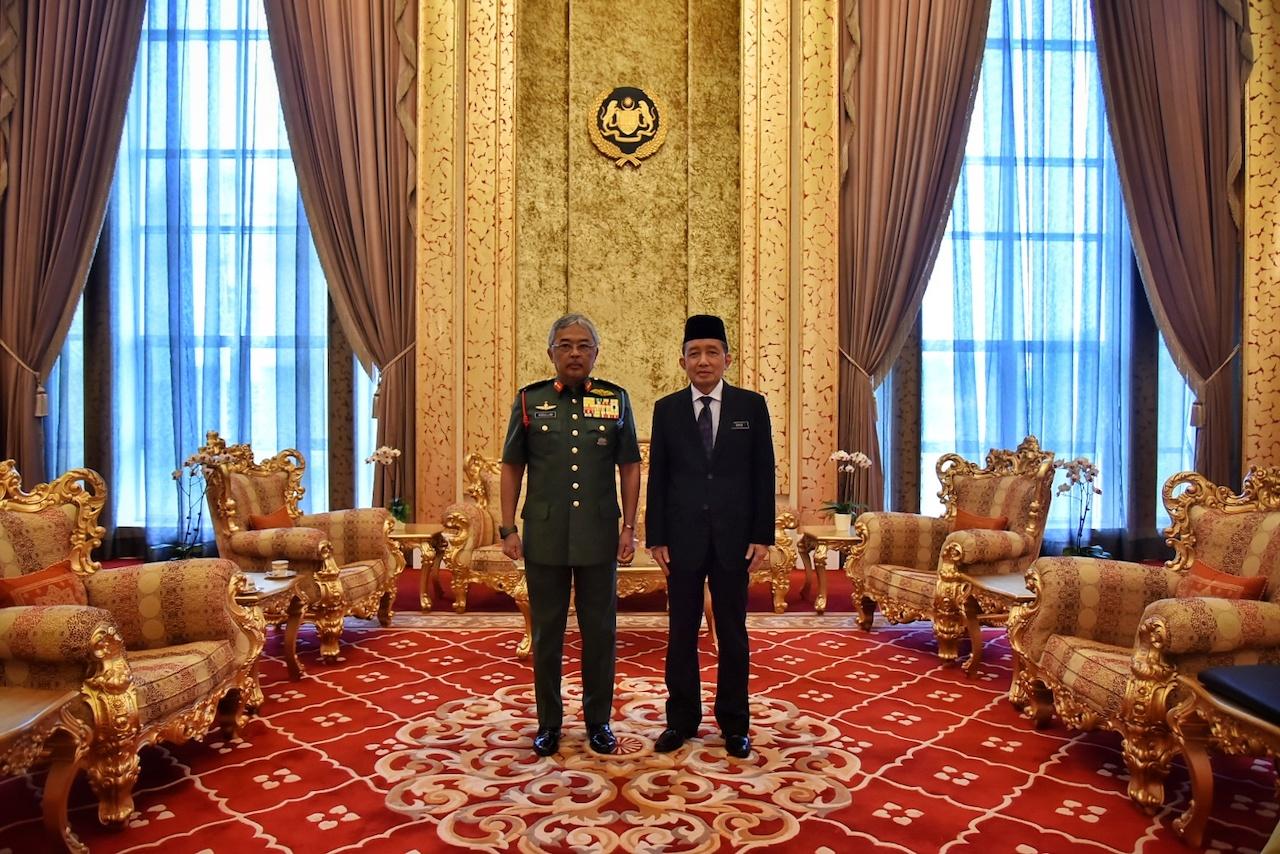 Yang di-Pertuan Agong Sultan Abdullah Sultan Ahmad Shah with Attorney-General Idrus Harun. Photo: Istana Negara