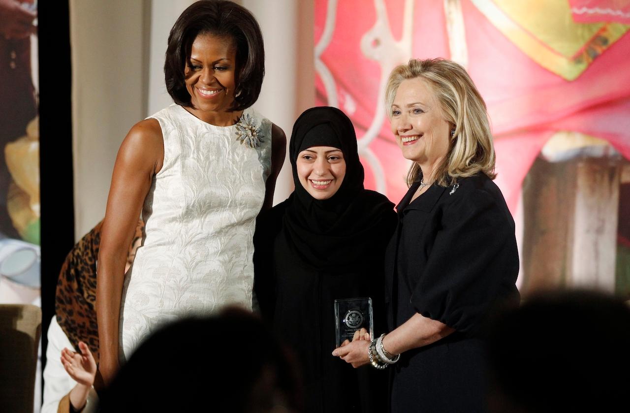 Then secretary of state Hillary Clinton and then first lady Michelle Obama present the 2012 International Women of Courage Award to Samar Badawi of Saudi Arabia, at the State Department in Washington. Badawi and another Saudi women’s rights campaigner, Nassima al-Sada, have been released from prison, three years after a sweeping crackdown by Crown Prince Mohammed bin Salman targeting female activists who'd peacefully advocated for greater freedoms, rights groups said June 27. Photo: AP
