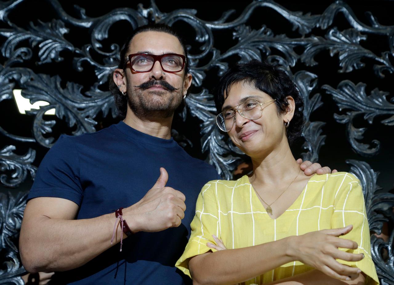 Bollywood actor Aamir Khan with his wife Kiran Rao as he celebrates his birthday at his residence in Mumbai, India, March 14, 2018. Photo: AP