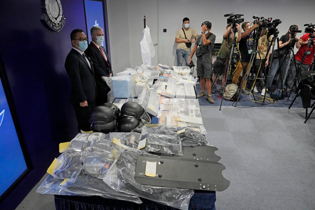 Confiscated evidence is displayed during a news conference at the police headquarters in Hong Kong, July 6, after several people were arrested over an alleged plot to plant bombs around the city. Photo: AP