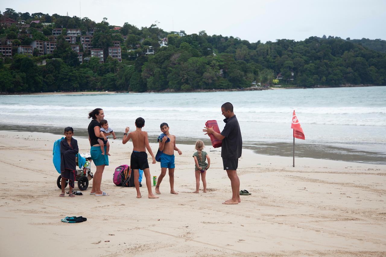 A family of tourists enjoy their vacation at Patong Beach in Phuket, southern Thailand, on July 7. Photo: AP
