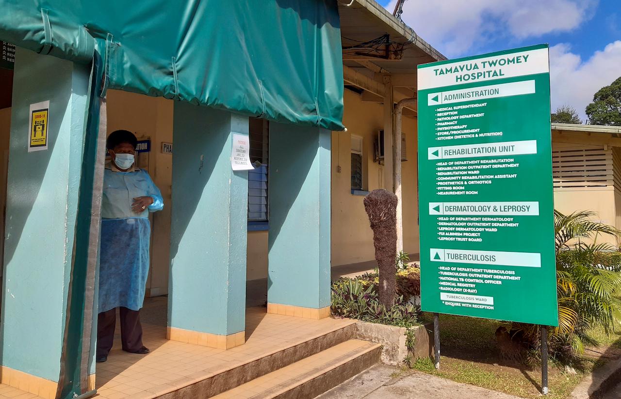 A nurse stands outside Tamara Twomey hospital in Suva, Fiji, June 25. Until April, Fiji had recorded no community cases for a year but a quarantine breach saw the highly contagious Delta variant rapidly gain a foothold. Photo: AP