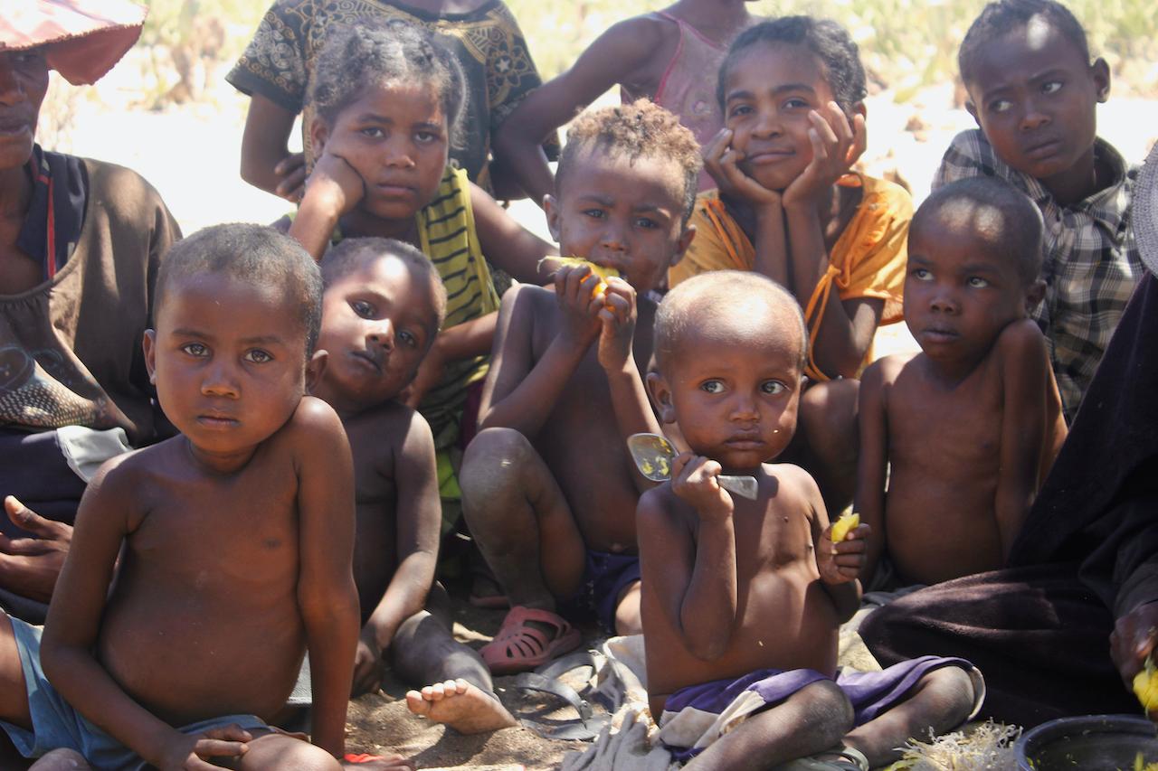 Children wait for food in the village of Fenoaivo, Madagascar, Nov 9, 2020. Rights group Oxfam says over half a million people are living in 'famine-like conditions', while 155 million live with 'extreme hunger'. Photo: AP