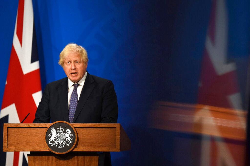 Britain's Prime Minister Boris Johnson speaks during a media briefing in Downing Street, London, July 12. Britain’s health secretary has confirmed that all remaining lockdown restrictions in England will be lifted in a week despite a sharp rise in coronavirus cases. Photo: AP