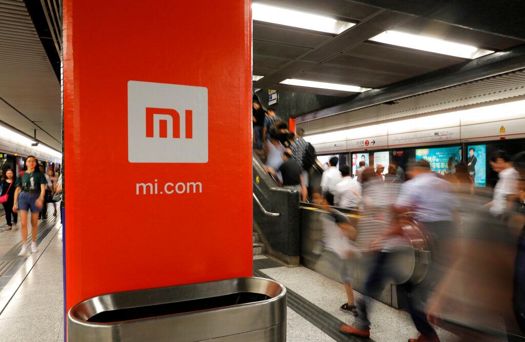 In this July 9, 2018, file photo, an advertisement for Xiaomi is displayed at a subway station in Hong Kong. Photo: AP