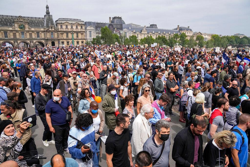 Anti-vaccine protesters march during a rally in Paris, France, July 17. Photo: AP