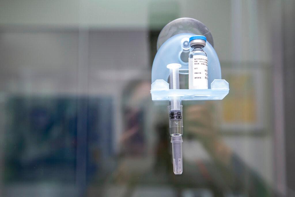 In this photo released by the Taiwan Presidential Office, a sample of the coronavirus vaccine produced by Medigen is displayed at the company in Hsinchu in northern Taiwan on Feb 20, 2020. Photo: AP