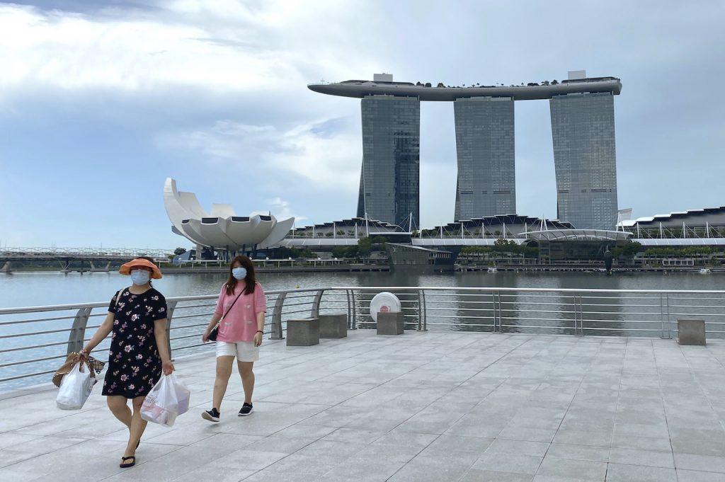 Singapore has already inoculated nearly 75% of its 5.7 million people, the world’s second highest total after the UAE, with half its population fully vaccinated. Photo: AFP