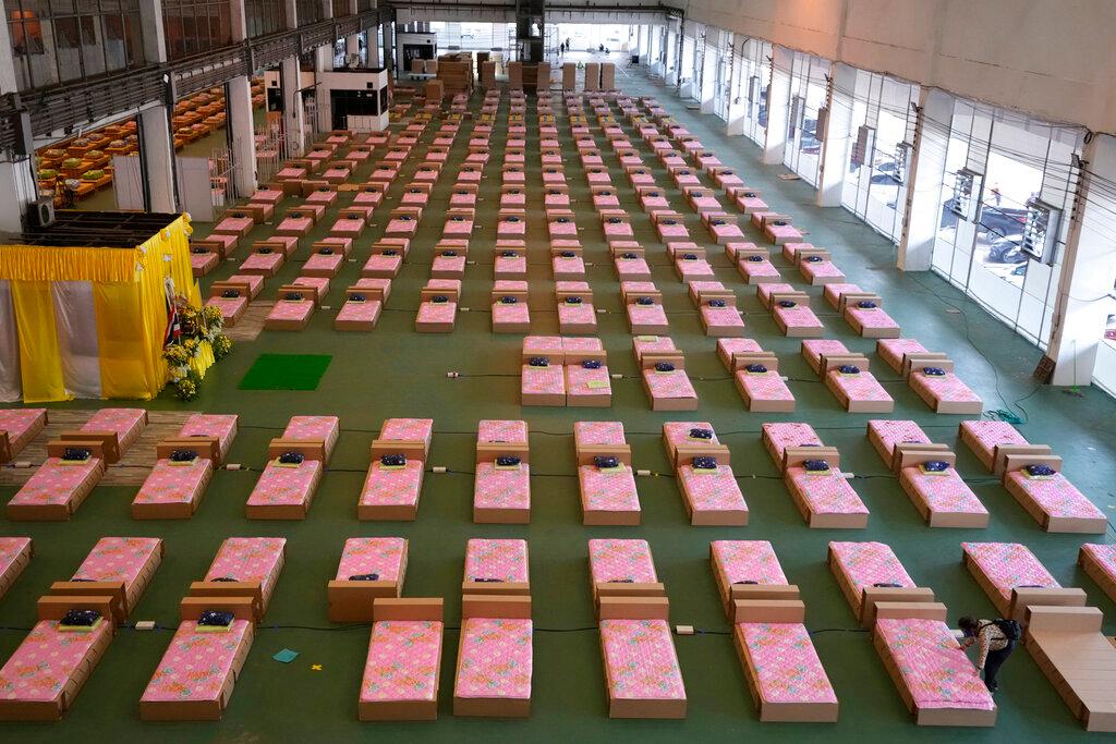 A 1,800-bed field hospital is set up inside a cargo building in Don Mueang International Airport in Bangkok, Thailand, July 29. Health authorities raced to set up yet another large field hospital in Thailand's capital as the country recorded a new high in Covid-19 cases and deaths. Photo: AP