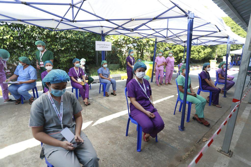 Health workers wait to receive the Covishield Covid-19 vaccine at the Ayeyarwaddy Covid treatment centre in Yangon, Myanmar, Jan 27. Photo: AP